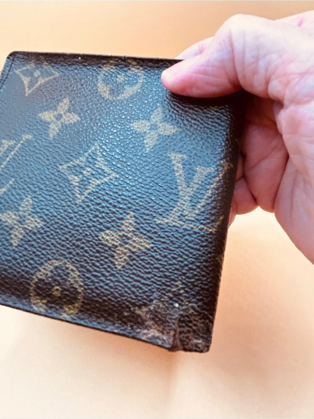 Louis Vuitton Monogram Canvas Bi-Fold Wallet in Brown